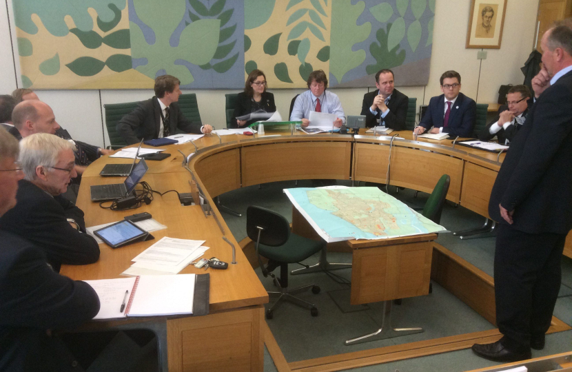 Rebecca chairing emergency flooding meeting
