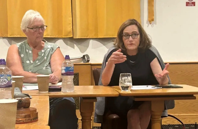 Rebecca speaking at the meeting