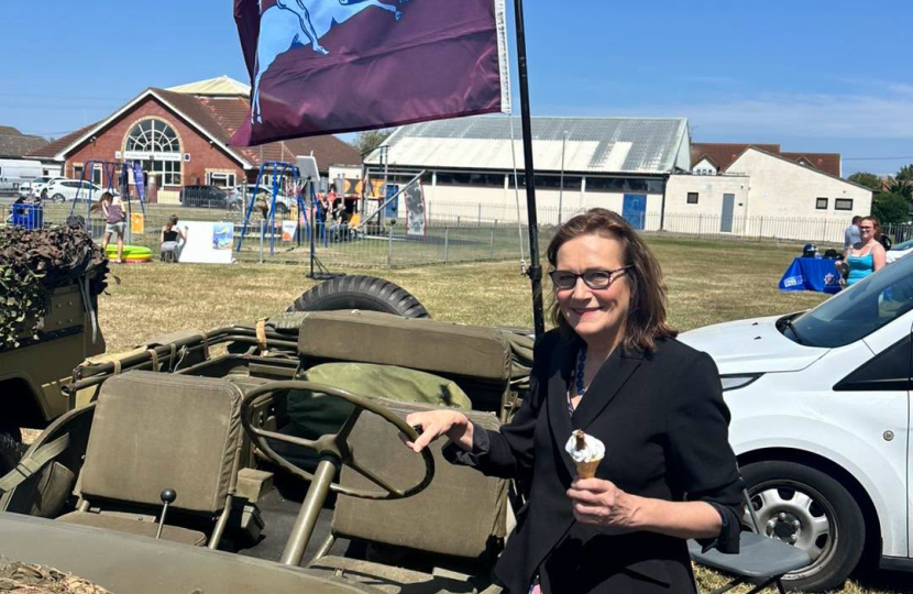 Rebecca and a WW2 vehicle