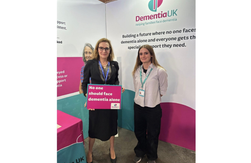 Rebecca Harris MP visiting Dementia UK's stand at Conservative Party Conference 2026