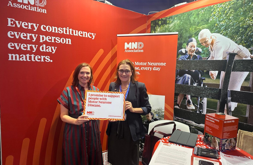 Rebecca Harris MP visiting MND Association's stand at Conservative Party Conference 2026