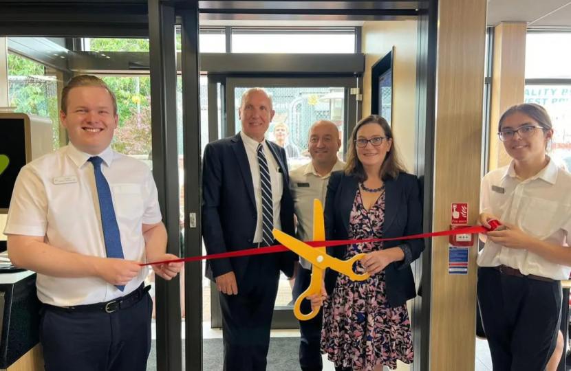 Rebecca cuts the ribbon