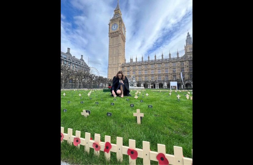 Rebecca laying the cross