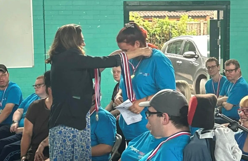 Rebecca handing out medals 2