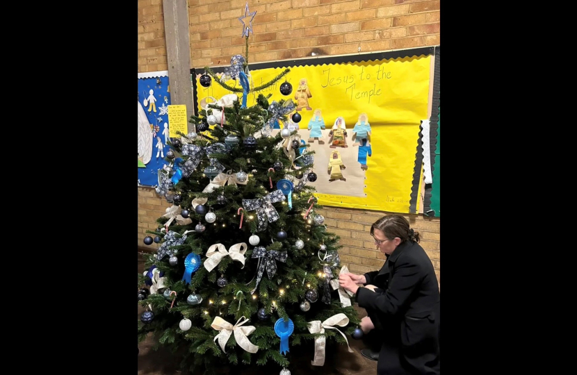 Rebecca decorating the tree