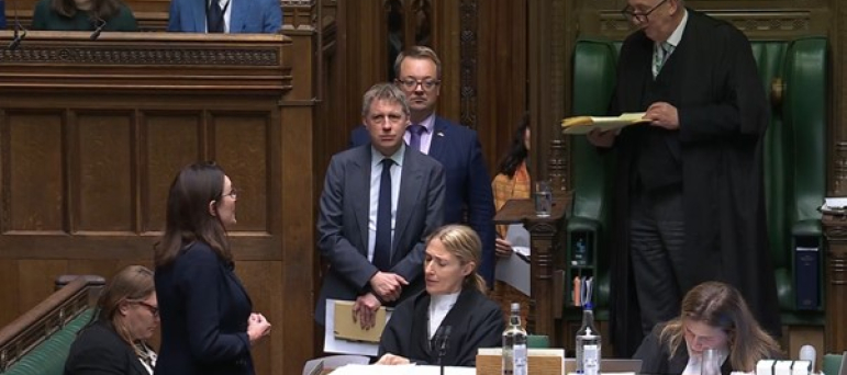 Rebecca introducing Tuks Law to Parliament