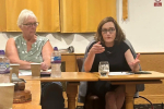 Rebecca speaking at the meeting