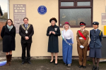 Rebecca attending the plaque unveiling