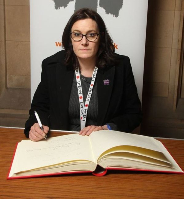 Rebecca signing
