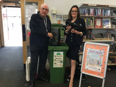 Rebecca Harris and Councillor Chas Mumford encourage recycling 