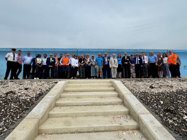 The tour group at the revetment site