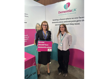 Rebecca Harris MP visiting Dementia UK's stand at Conservative Party Conference 2026