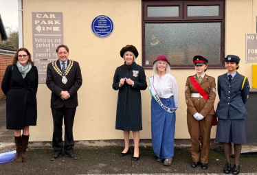 Rebecca attending the plaque unveiling
