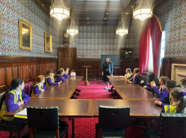 Rebecca meeting pupils