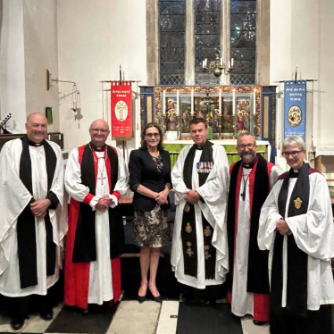 Rebecca welcoming Father David