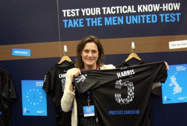 Rebecca displays her Men United football top 