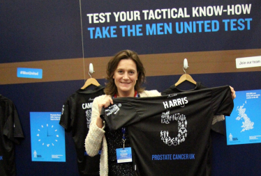 Rebecca displays her Men United football top 